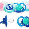 A collection of soft silicone baby pacifiers and soothers in various colors including pink, blue, and green.