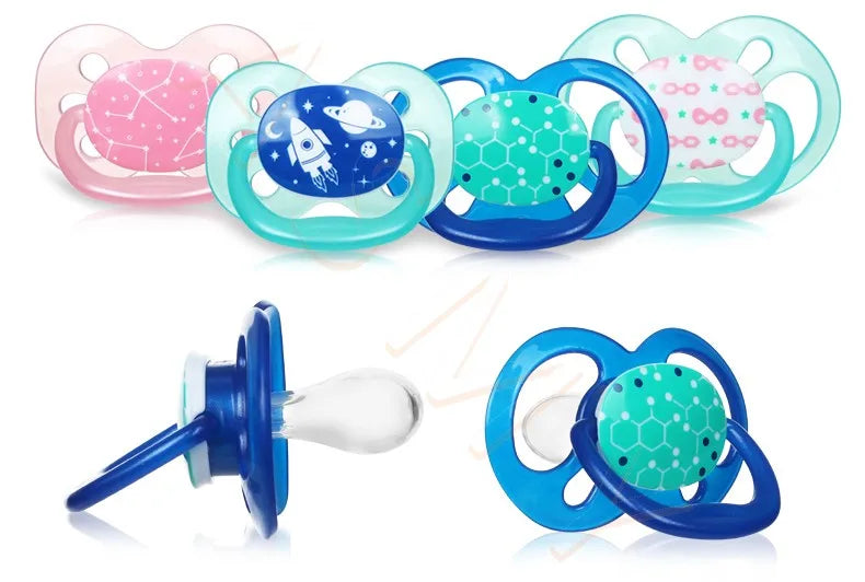 A collection of soft silicone baby pacifiers and soothers in various colors including pink, blue, and green.