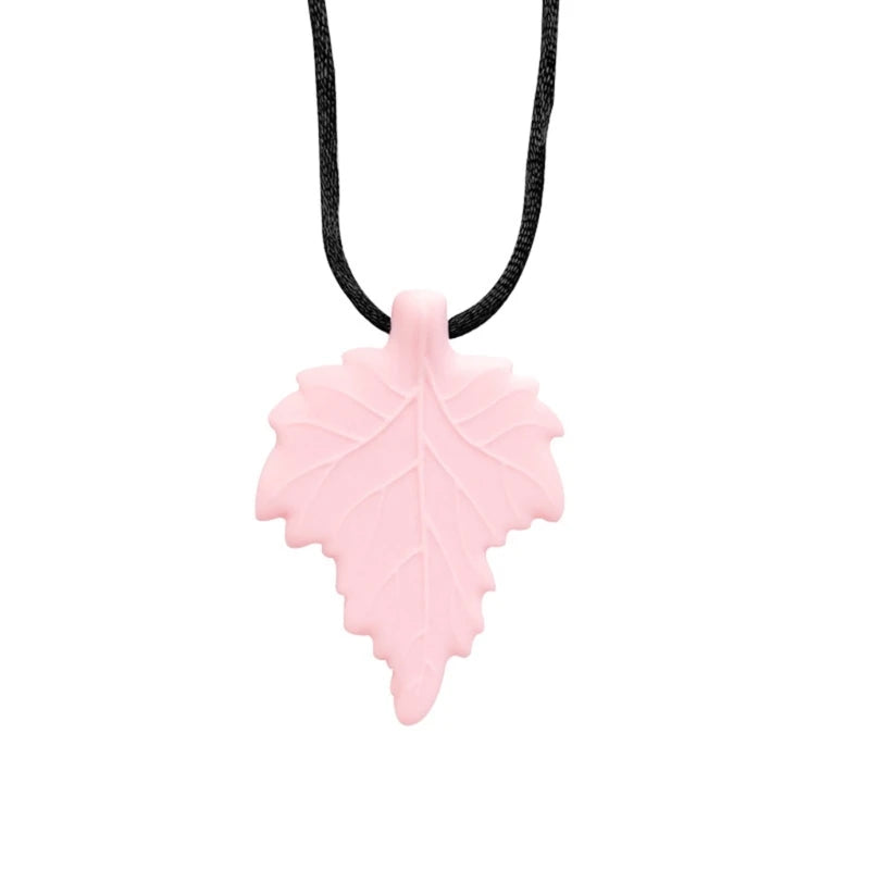 A pink silicone leaf pendant on a black necklace for teething and sensory calming.