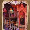 A DIY book nook kit featuring a detailed tarot-themed scene with intricate architecture and LED lighting.