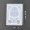 A clear silicone mold shaped like a bear for resin jewelry and crafts.