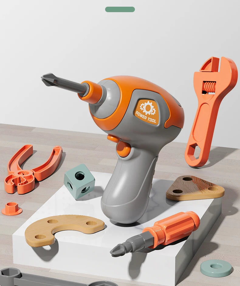 An orange and gray power tool is shown next to various wooden and plastic tools on a white surface.