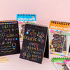 Collection de blocs-notes et cahiers colorés avec divers designs pour enfants