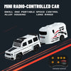 A white mini radio-controlled car with a trailer, along with its remote control.