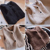 Three views of kids' plush fleece vests in black, cream, and brown.