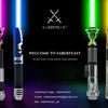 A collection of lightsaber staffs in various colors and finishes displayed against a dark background.