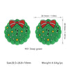 Deep green Christmas tree silicone bead with a red bow and gold stars