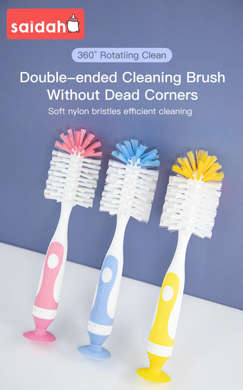A set of three double-ended cleaning brushes in pink, blue, and yellow for efficient cleaning.