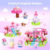 A collection of pink and purple magnetic building blocks and structures inspired by a castle theme.