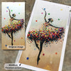 Finished diamond painting featuring a fairy in a colorful floral dress on a gold background