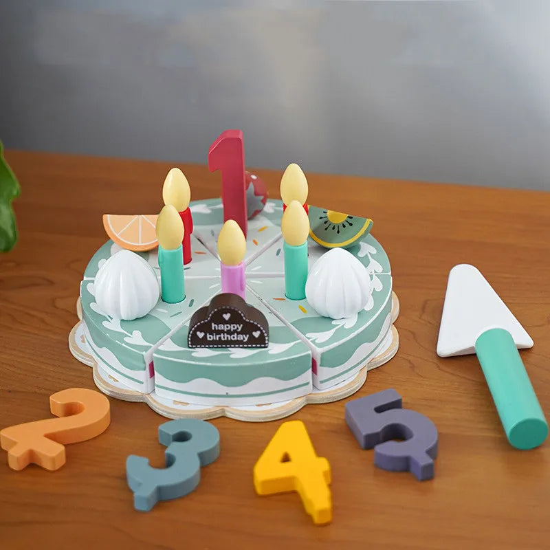 A wooden pretend play tea party set featuring a large red number 1 and various colorful wooden shapes on a table.