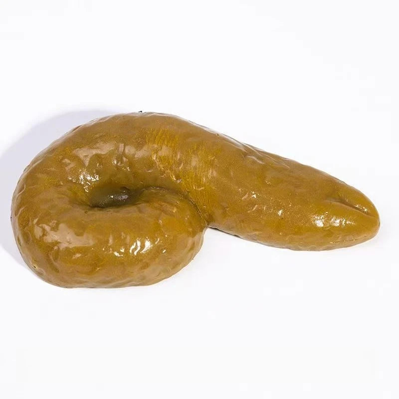 A realistic, squishy prank toy shaped like soft fake poop, colored brown and yellowish-green.