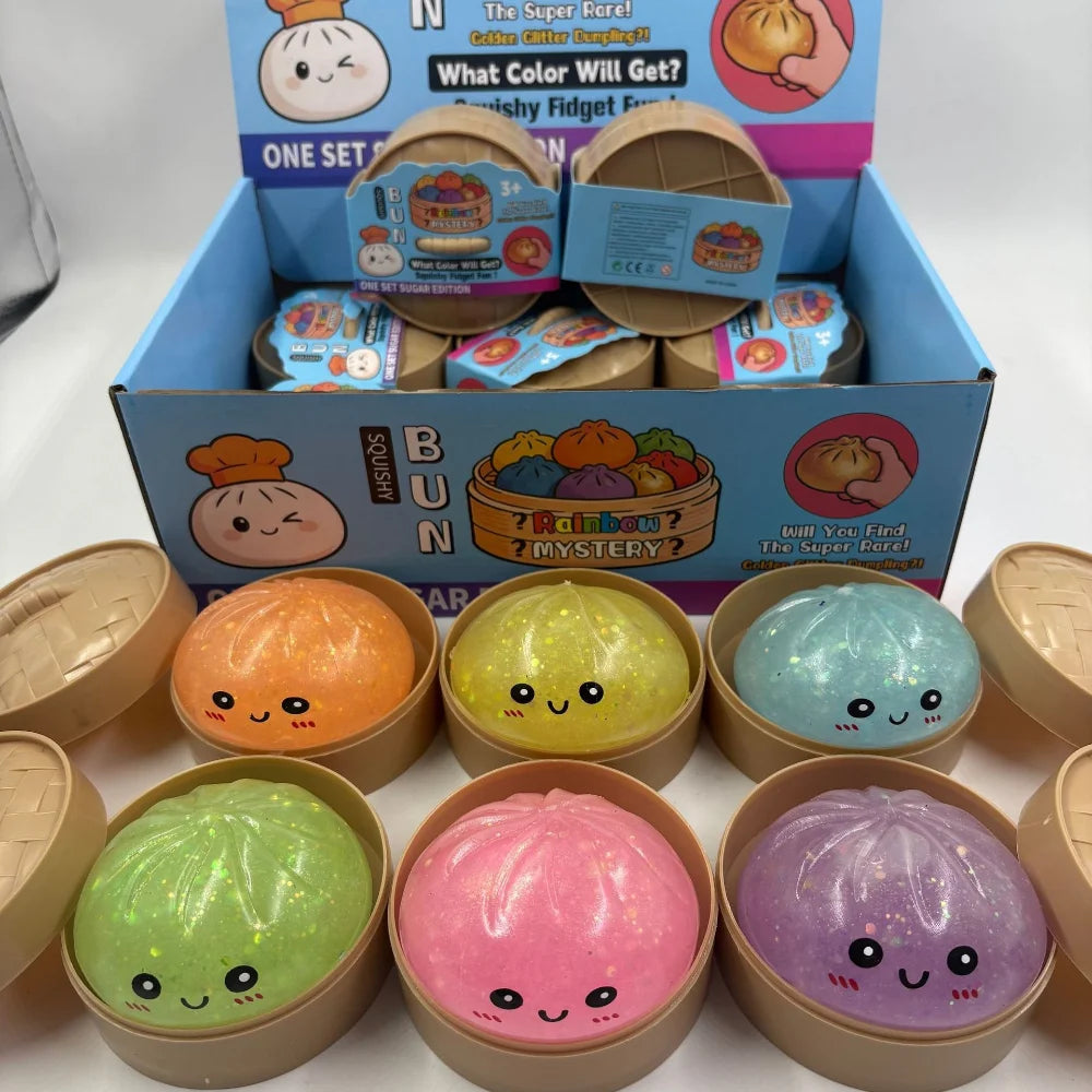 A collection of soft sensory squishy dumpling toys in various colors including orange, yellow, blue, green, pink, and purple.
