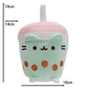 A light mint green plush cat doll with pink accents and large brown polka dots.