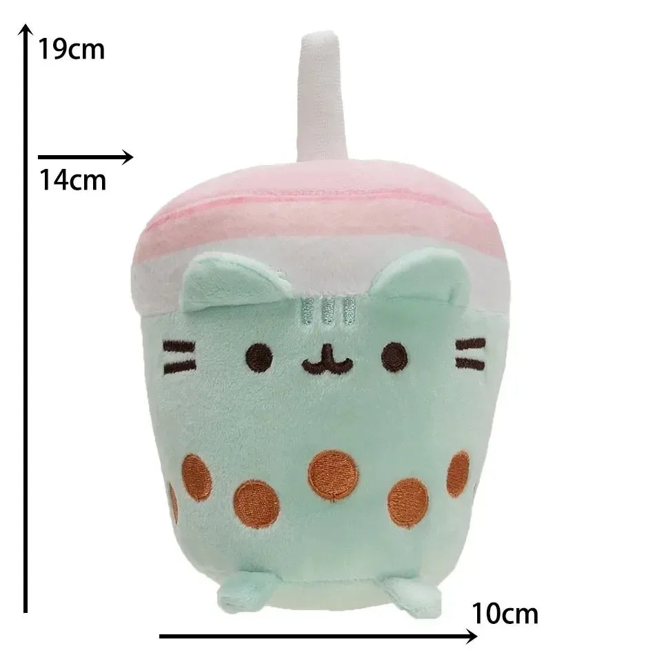 A light mint green plush cat doll with pink accents and large brown polka dots.