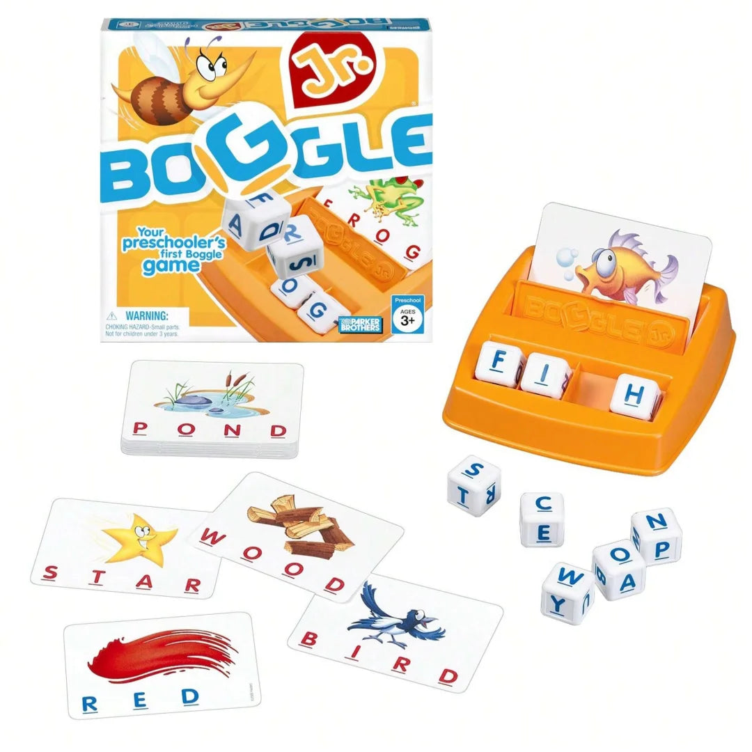 A box of Boggle dice game featuring yellow and orange components, including tiles for words like POND, STAR, RED, and BIRD.