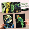 A collection of glow-in-the-dark scratch art cards featuring animals and celestial themes.