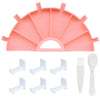 A pink 6-compartment diamond painting organizer tray with a pen and multiple white plastic tools.
