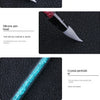A dual-ended silicone pen featuring a soft silicone head and a crystal-enrolled handle for nail art.