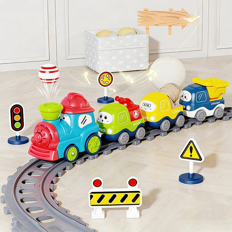 A set of electric steam train toys featuring magnetic cars, lights, and sounds on a track.
