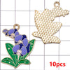 A set of ten gold-colored enamel flower charms featuring purple and blue flowers on green leaves.