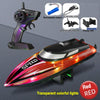 A high-speed RC boat with transparent colorful lights, a charging cable, and a display rack.