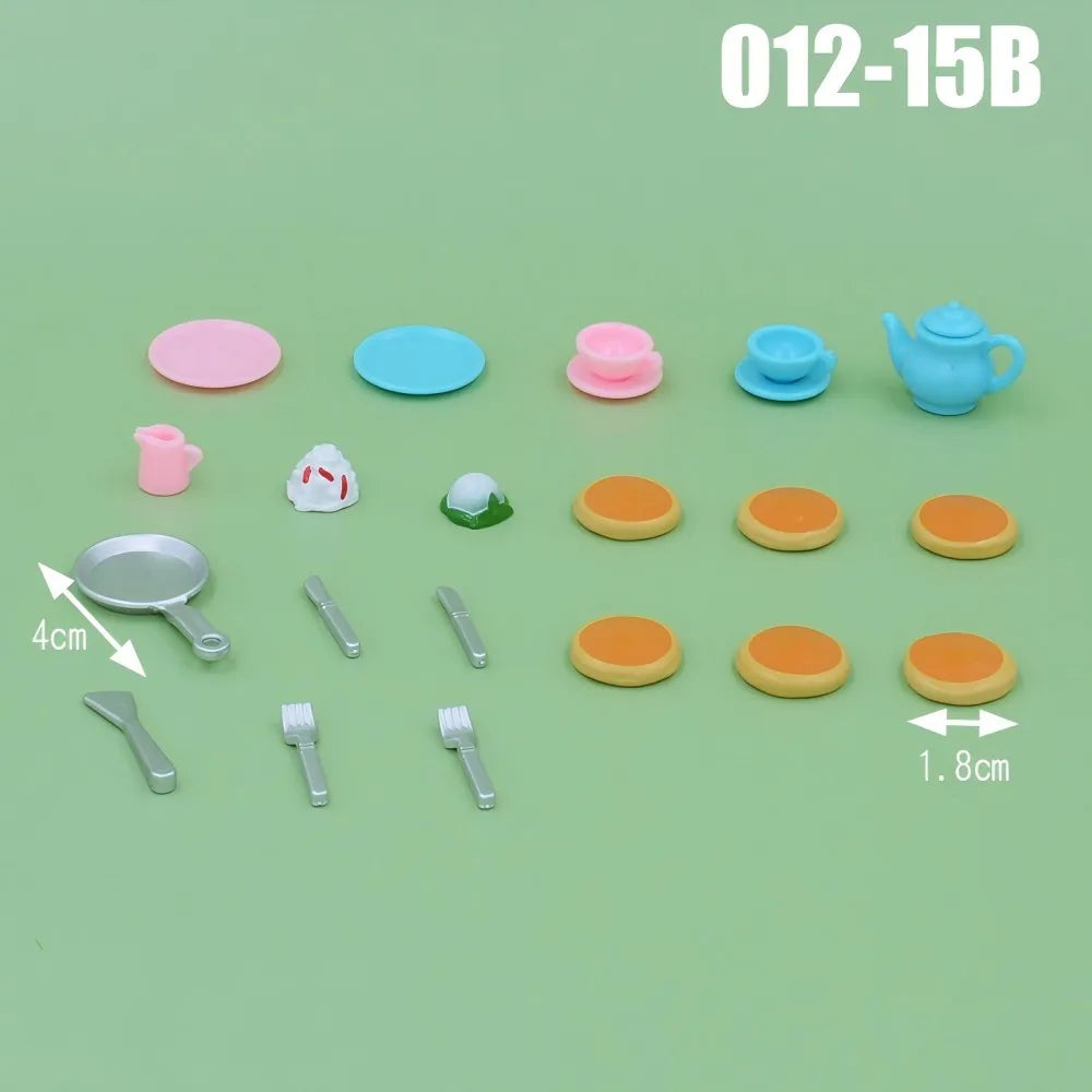 A collection of colorful dollhouse furniture playset including plates, cups, and teapot in various pastel shades.