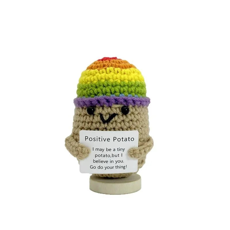 Handwoven crochet pencil ornament shaped like a smiling potato with colorful yarn hair