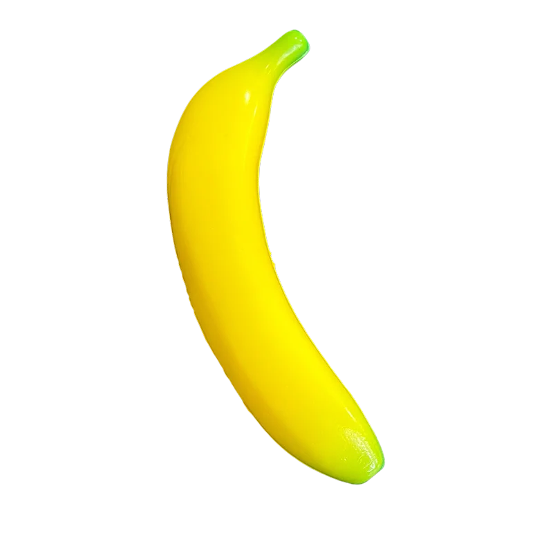 A bright yellow banana-shaped stress relief toy against a black background.