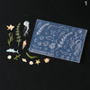 A clear silicone mold tray containing various 3D ocean-themed shapes for DIY nail art design.