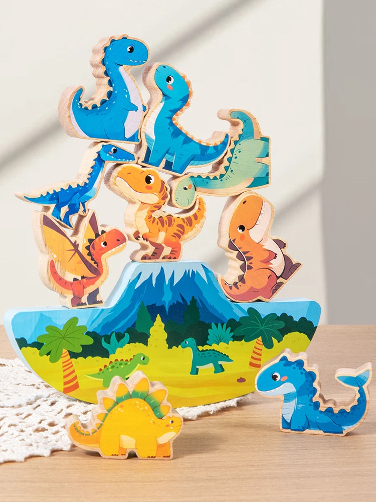 A stack of wooden dinosaur blocks in various shades of blue and orange, used as a Montessori balance toy.