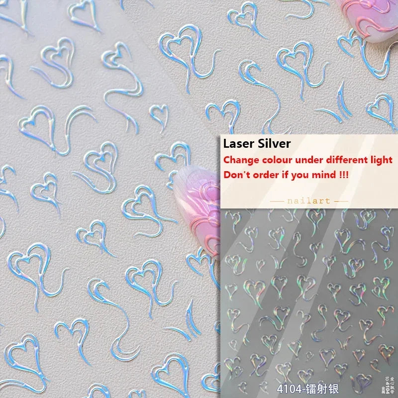 Silver nail art stickers featuring heart shapes with a gradient color effect
