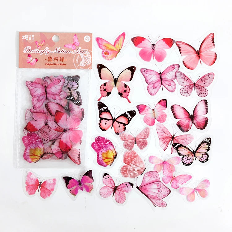 A sheet of colorful butterfly stickers in various shades of pink, purple, and orange for scrapbooking