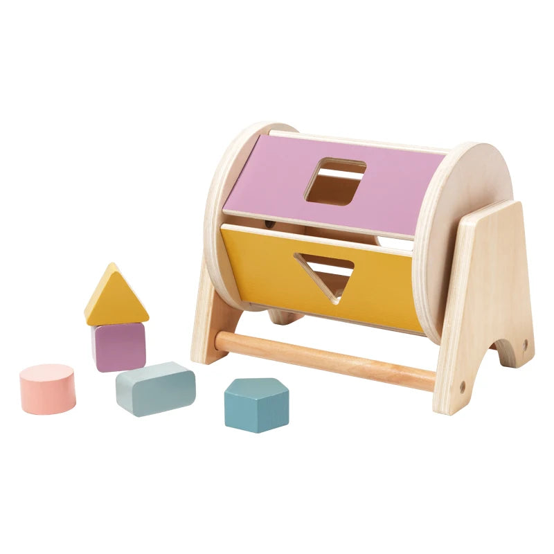 A wooden hand bell with two colored compartments for sensory play.
