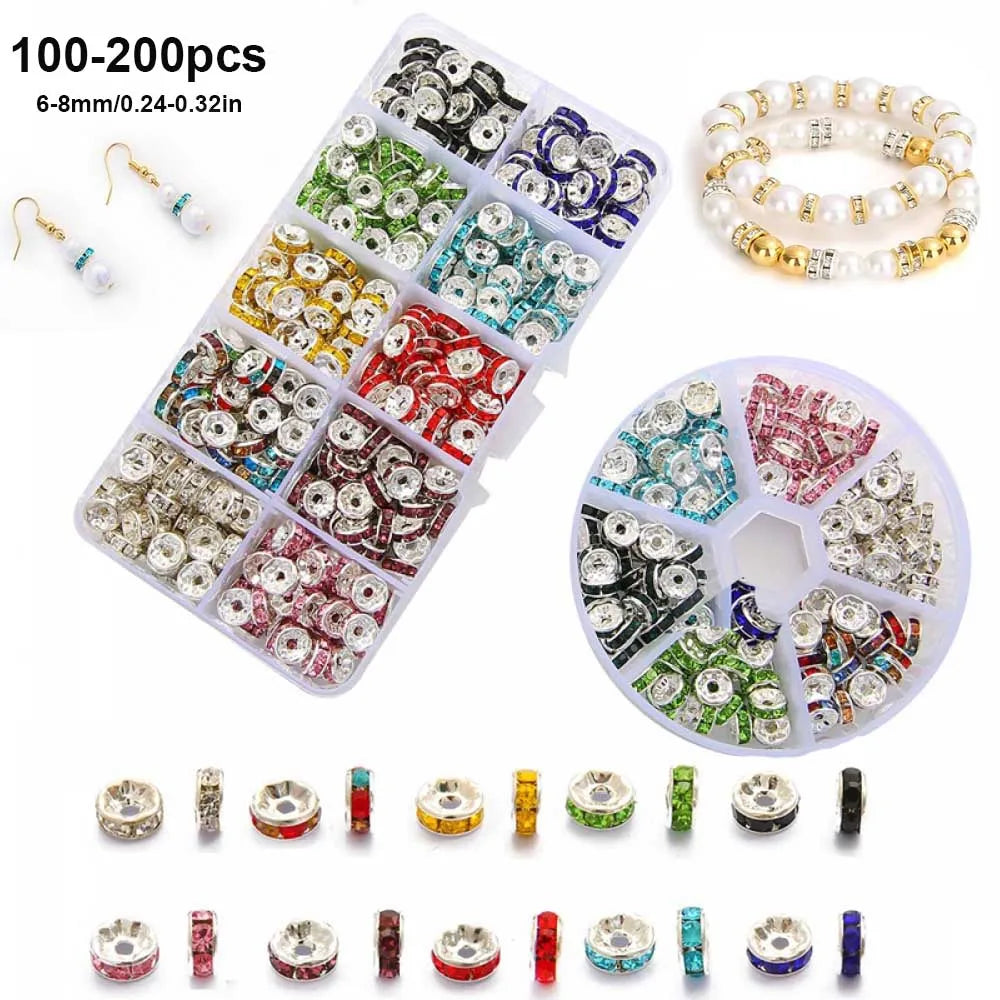 A collection of 100-200 spacer beads in various colors and styles for jewelry making, including round, flat, and decorative s