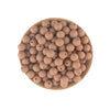 A wooden bowl filled with small, round, light brown silicone beads for jewelry making and crafts.