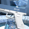 A white electric automatic water gun is shown with its drum magazine removed, demonstrating a water-proof storage method.