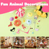 A collection of fun animal decorations including a pink feather, yellow flower, and various accessories like hats, glasses, a
