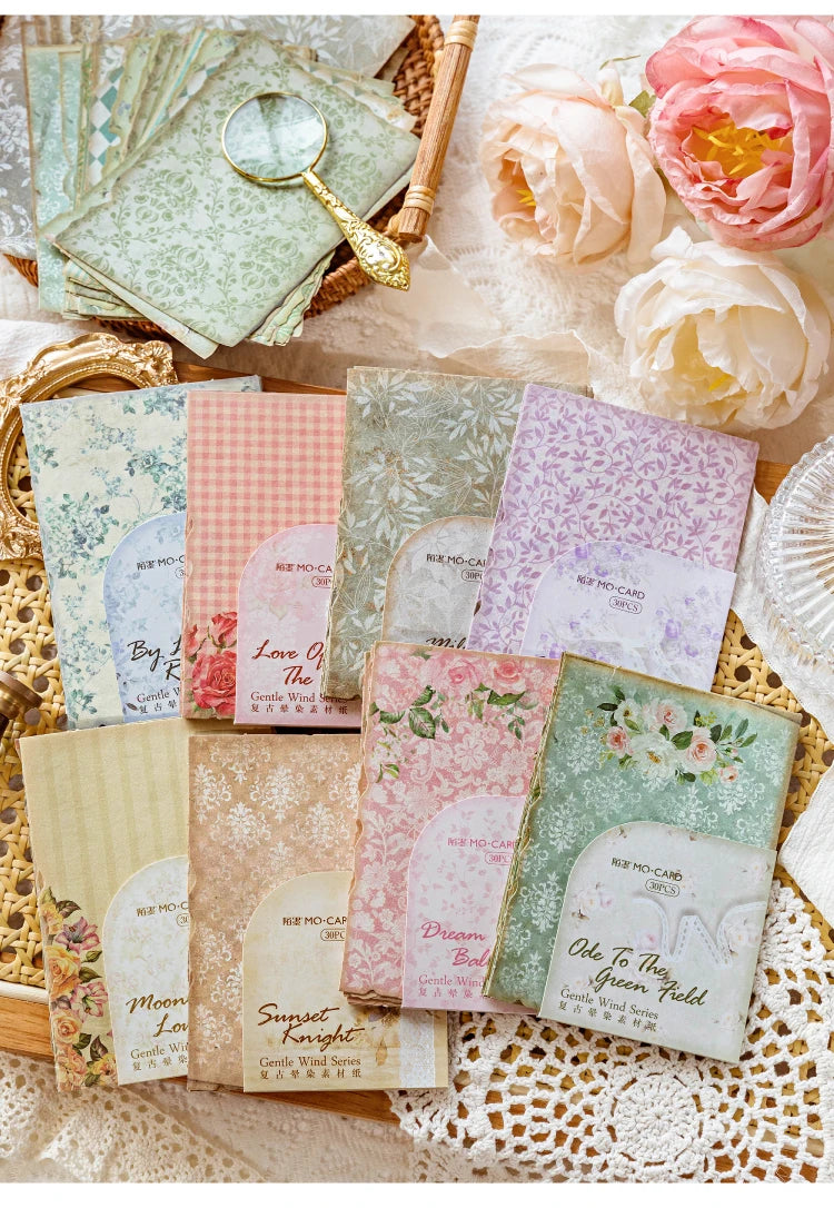 A collection of vintage paper sheets featuring floral and nature designs for journaling and scrapbooking