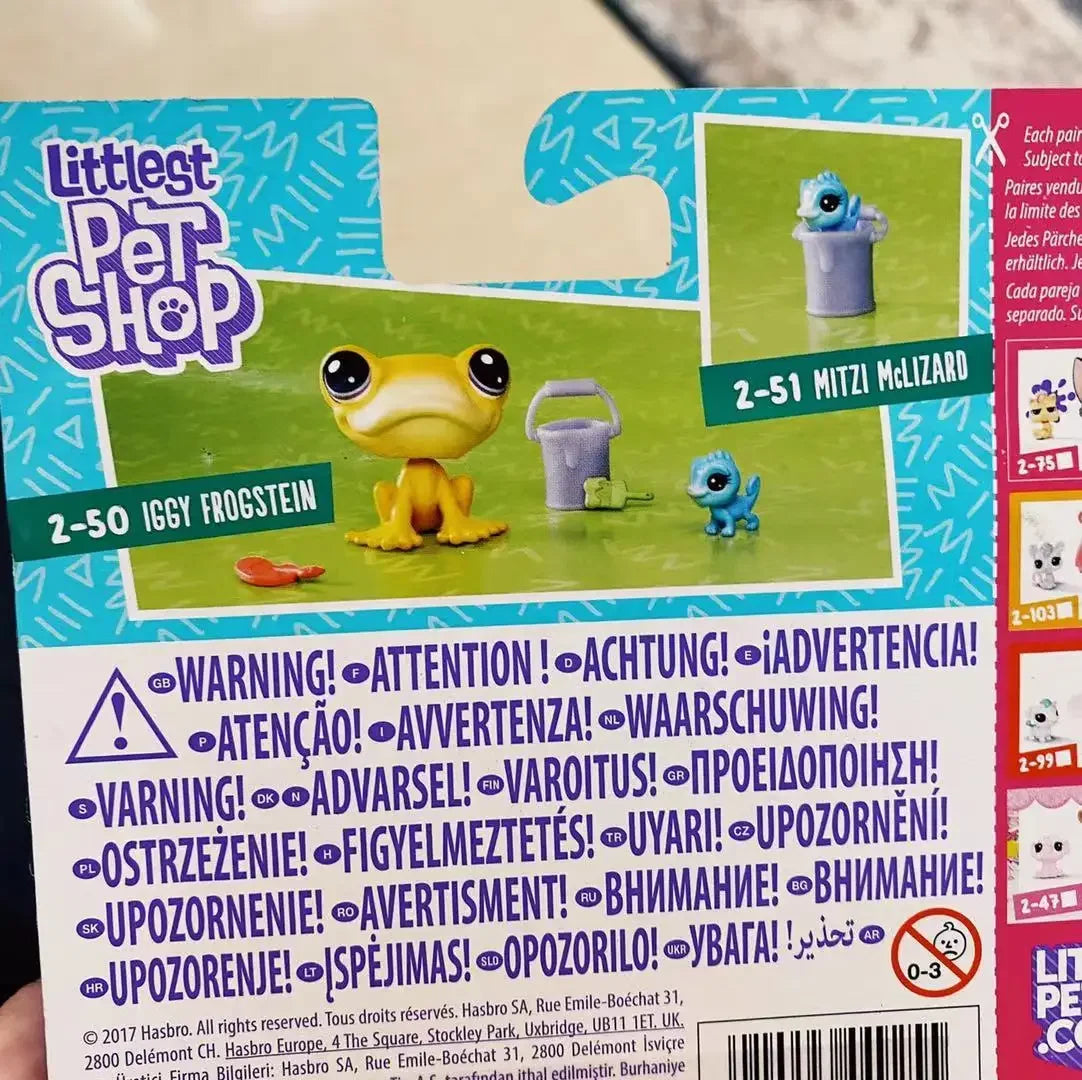 A packaging box for a set of mini posable animal figures, including a frog, a small blue creature, and other animals.