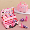 A pink princess pretend play makeup set with various colored cosmetics and a matching pink suitcase.