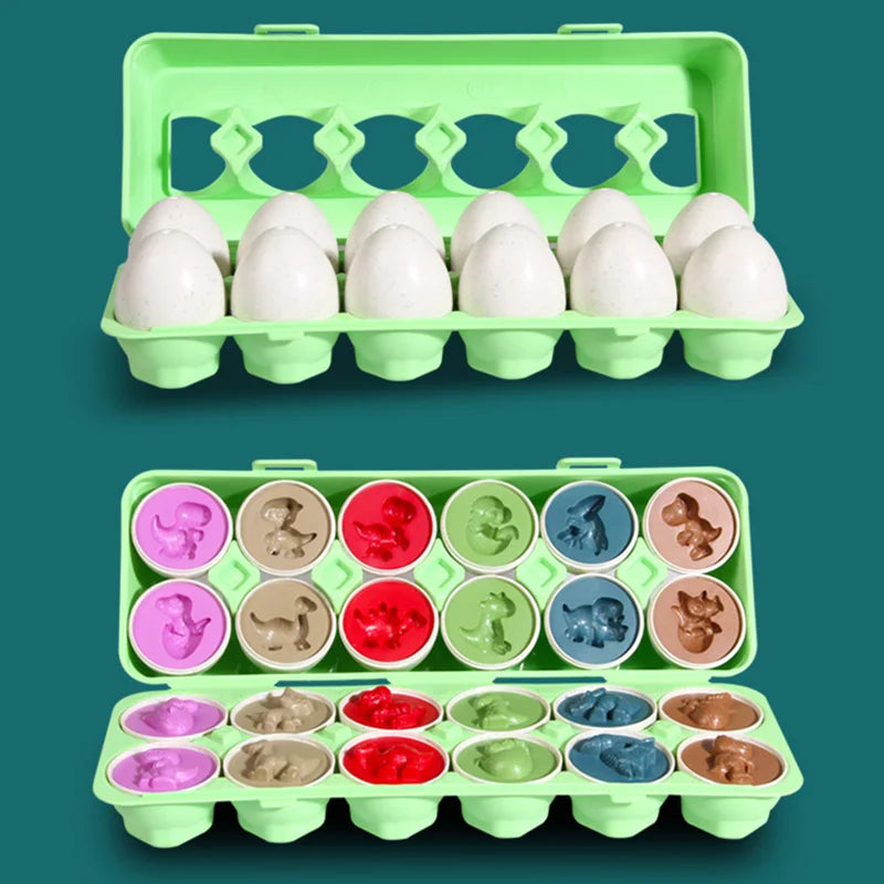 A green plastic sorter tray holding multiple white eggs and various colored sensory items for toddlers