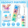 A clear plastic LED keyboard keycap fidget keychain with various colors and a metal ring, designed for stress relief.