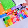 A collection of colorful DIY mini bead sets with templates and keychain accessories in various shades of green, purple, orang