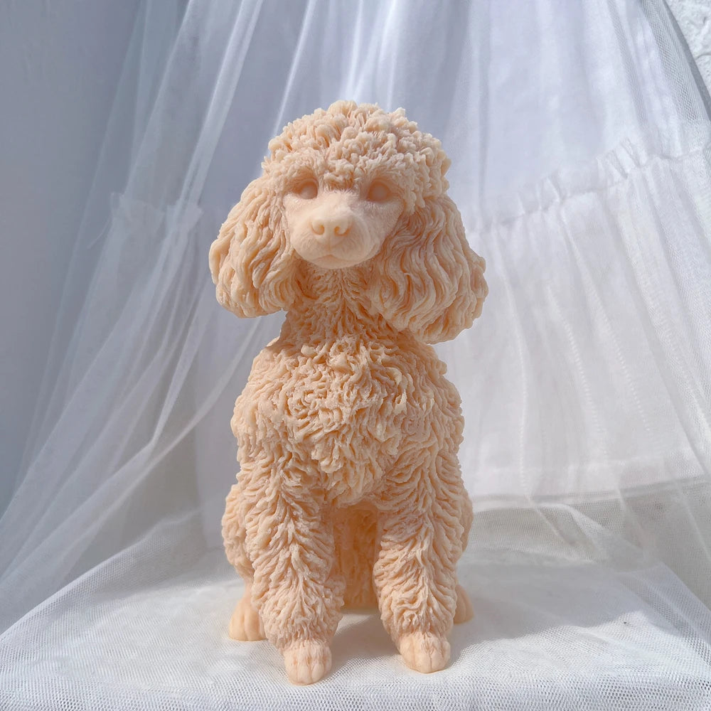 A light peach colored poodle dog silicone candle mold for DIY crafting displayed against a white sheer fabric background.