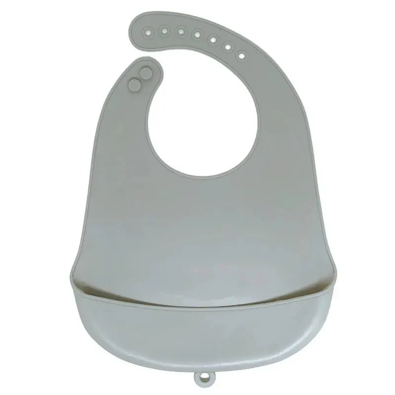 A white waterproof silicone baby bib with a catch pocket for feeding