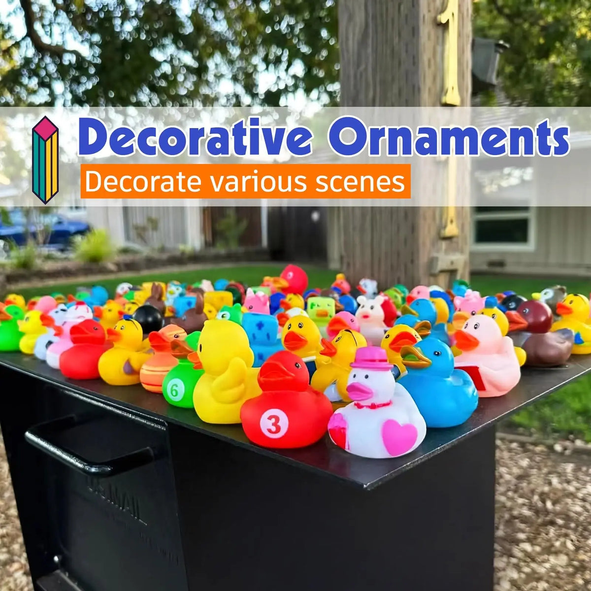 A collection of colorful mini rubber duckies party favors arranged on a dark surface.