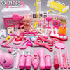 A pink kids doctor pretend play medical kit featuring various tools like a stethoscope, syringes, and plastic instruments.