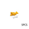Five yellow plastic marine creature building blocks.