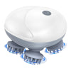 A white electric scalp and body massager device with three rotating massage heads.